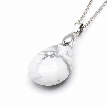 A silver teardrop pendant necklace featuring a white howlite stone with gray veining, shown on a clean white background.